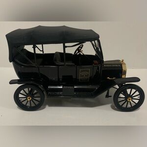 Vintage Black Model Car with Gold Accents